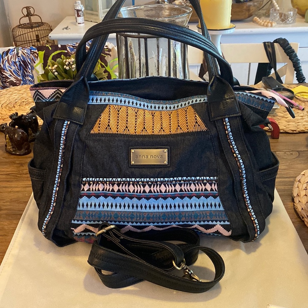 Anna Nova brand new with no tag with adjustable leather straps and leather trims